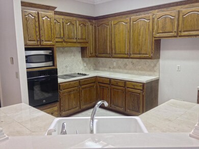 Kitchen with Marble Counters
