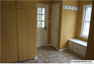 Laundry room with vinyl flooring