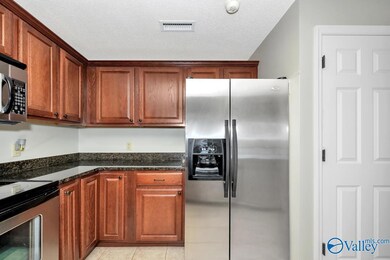 Tile flooring, granite countertops, Pantry, Stainless steel appliances