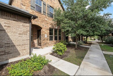 Doorway to property with brick siding