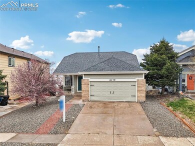 View of front facade with brick siding, driveway, a shingled roof, and a garage