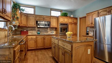 A cooks kitchen with new granite counter tops and 
