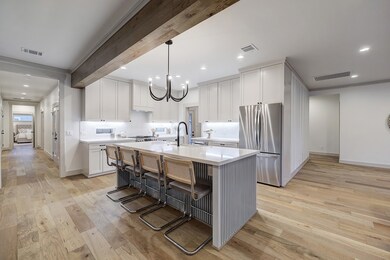 Nestled at the heart of this home, the kitchen sta