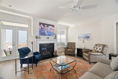 Living room featuring a wealth of natural light, c