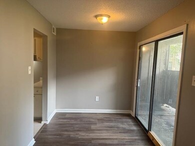 Foyer with dark hardwood / wood-style flooring and