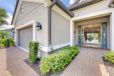 View of exterior entry featuring a garage