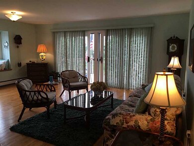 Living Room. SLIDERS TO DECK NICE LIGHT FROM DOUBL