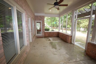 LARGE FRESHLY PAINTED COVERED PATIO OVER LOOKS THE