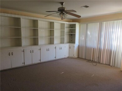 Living room with wall of bookcases