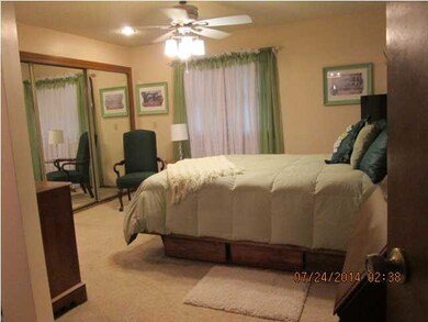 Master suite with full wall of closets