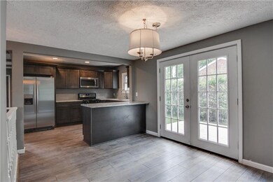 Kitchen/Dining Area. Open to the new side deck.