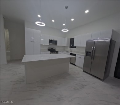 2227 NW 3rd Ave, Cape Coral, FL 33993 - photo 5