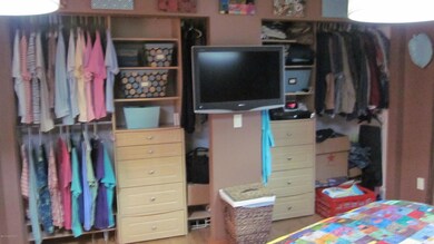 His and Her Closet Space in Master