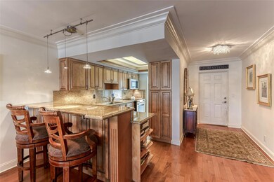 Kitchen with breakfast bar  with granite counters