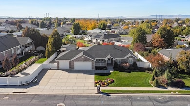 Aerial view of residential area featuring a mountainous background