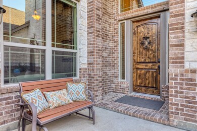 The main entrance of this meticulously designed house for sale. It sets the tone for the elegance and warmth found within.
