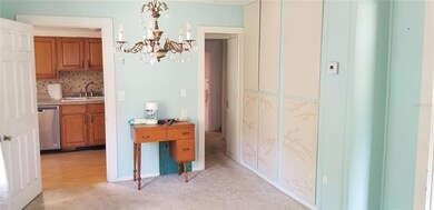 DR, left door to Kitchen, right door to bedrooms