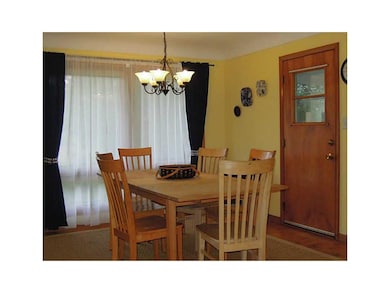 Dining Area. Oak flooring, overlooks private back 