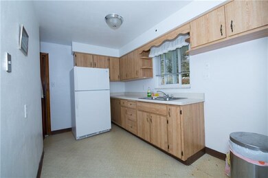 The kitchen cabinets have been refaced and are rea