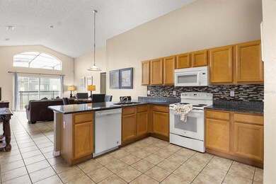 Kitchen with backsplash looking towards the living room