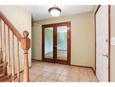 Front entry with French doors into Den/Office