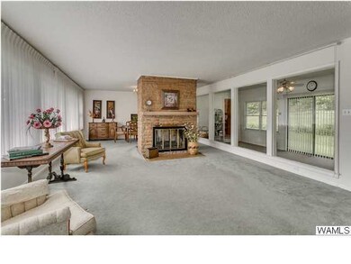 Family Room from front Entry- Hardwood Flooring un