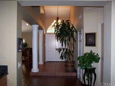 Formal entry with vaulted ceilings