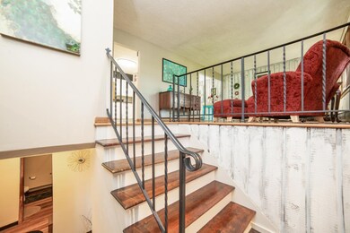New Hardwood Steps Leading to Spacious Living room