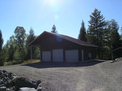 Triple Car Garage w/lean to
