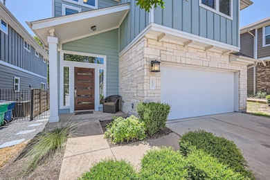 Doorway to property featuring board and batten si