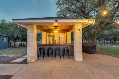 View of patio featuring area for grilling