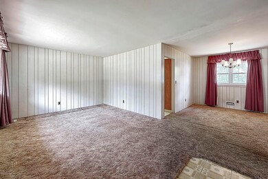 Living Room Opens to Dining Room