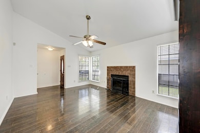 Unfurnished living room featuring baseboards, cei