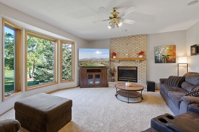 Family room w/gas fireplace - so much natural light!