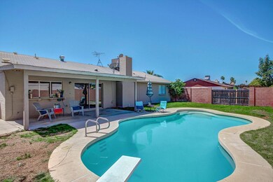 Sparkling pool and covered patio!