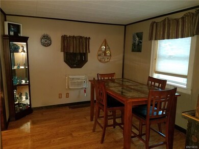 Dining room. Wall a/c unit.