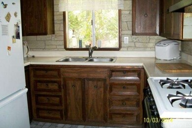 Convenient kitchen with view of the front yard