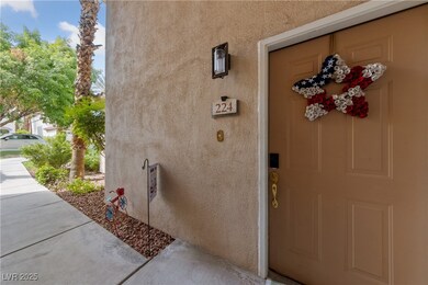 Entrance to property featuring stucco siding
