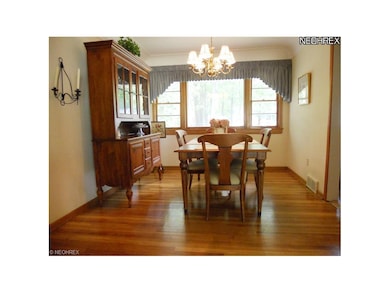 Large Formal Dining Room with Gleaming Hardwood Fl