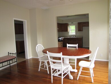 Dining room also with hardwood floors