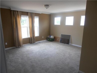 Master bedroom with lots of natural light from all the windows