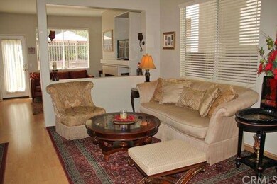Lovely formal living room with an open wall to the