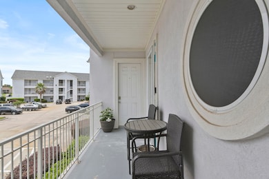 Cozy balcony located in front of the unit with two