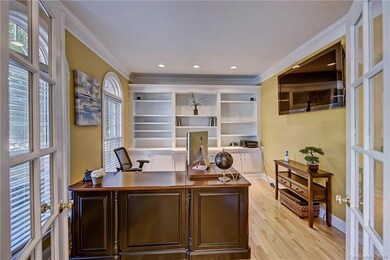 Main floor office with built in bookcase.