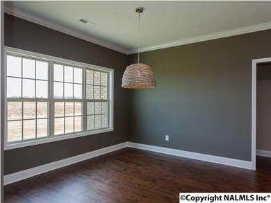 Whether you need a dining room, office, or maybe a piano room; this open space is waiting on you make memories here!