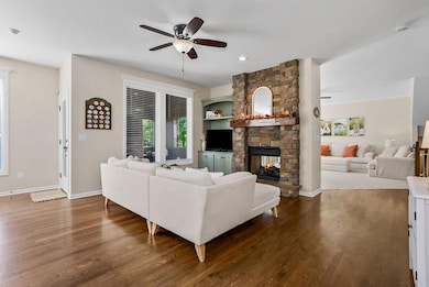 Hearth room with updated built in cabinets with a view to the covered lanai. Perfect set up for hosting.