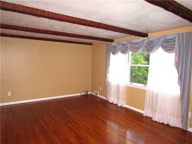 Living Room. Lots of Natural Light shines through 