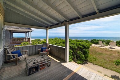 Covered porch with view of the ocean