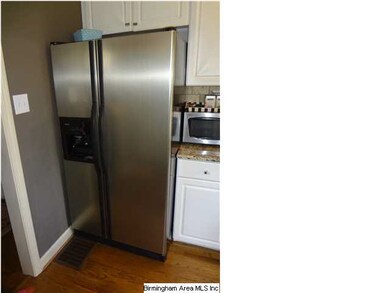 Side by side stainless steel refrigerator included