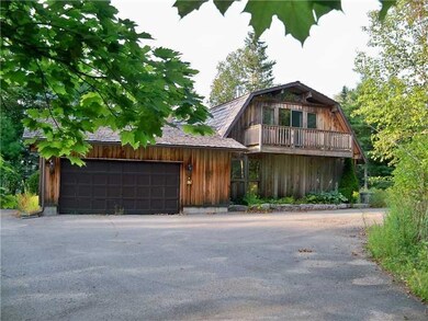 Exterior Back and paved driveway.